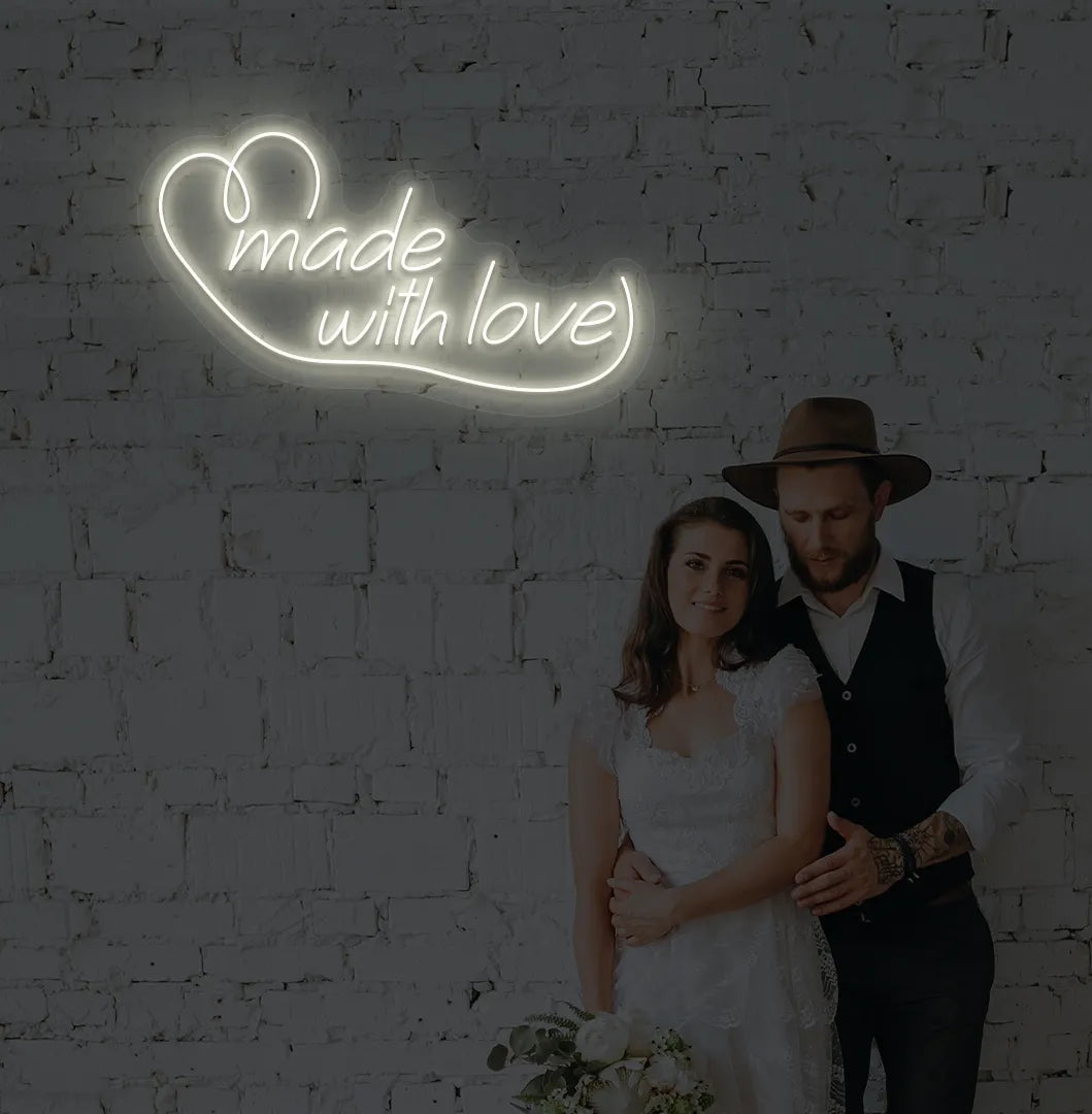 Bright warm white made with Love neon sign for wedding backdrop decoration.