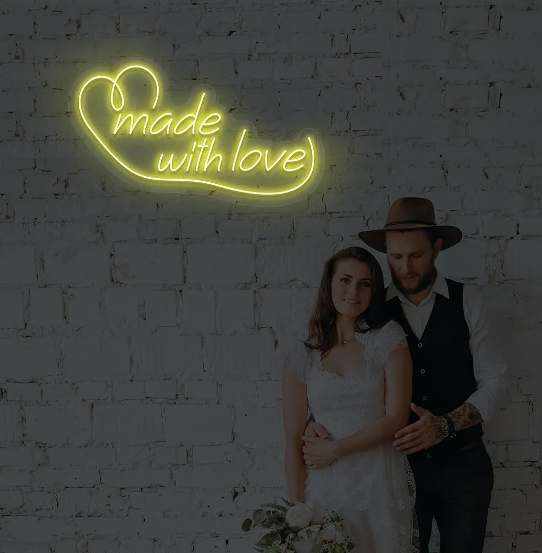 Bright yellow made with Love neon sign for wedding backdrop decoration.