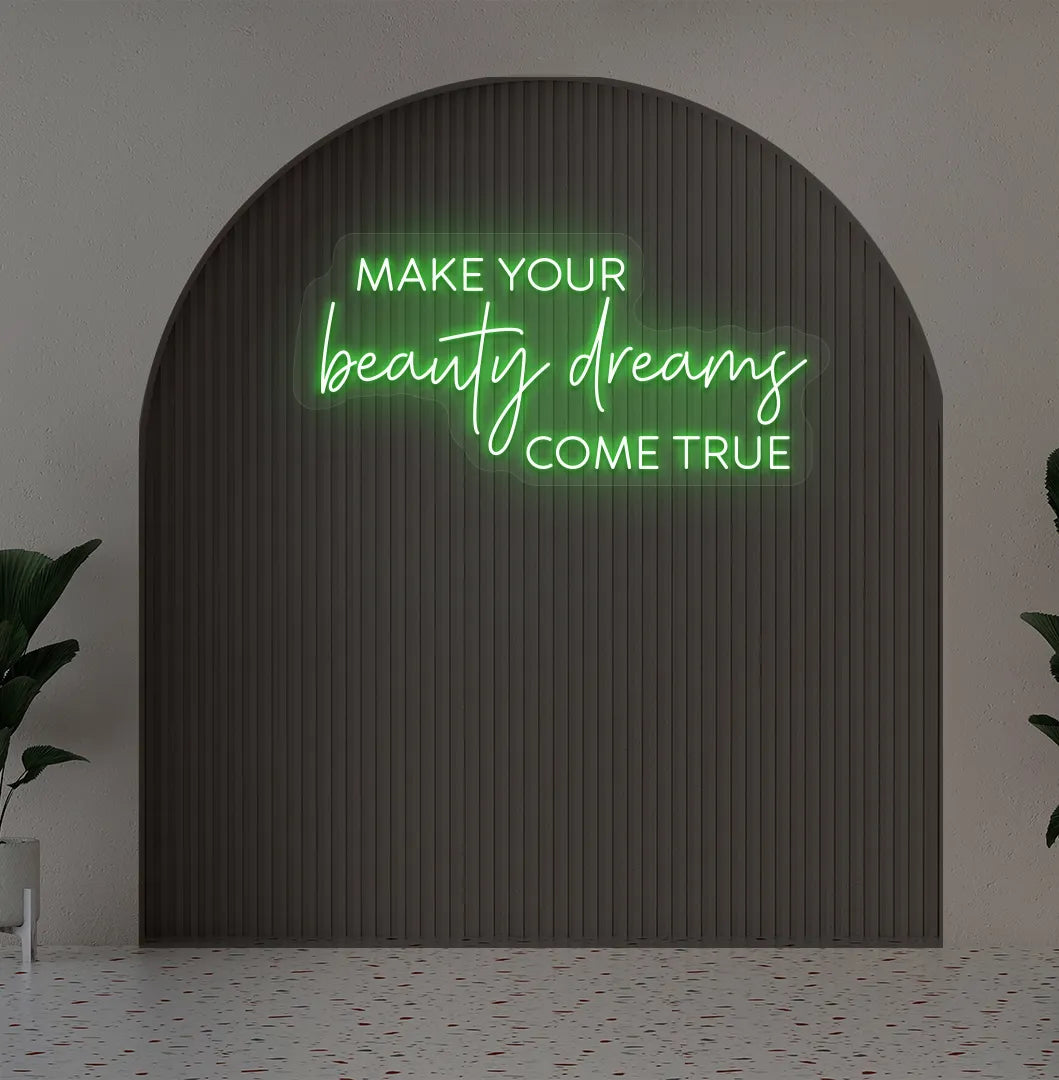 Green "make your beauty dreams come true" LED neon sign for beauty studio setup.