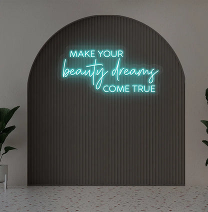 Image of a "Make your beauty dreams come true" neon sign in ice blue color on salon wall decor.