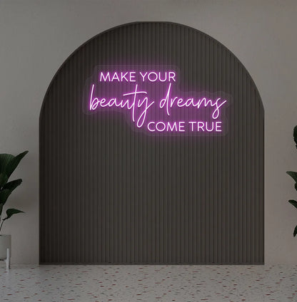 Purple "make your beauty dreams come true" LED neon sign for beauty studio setup.