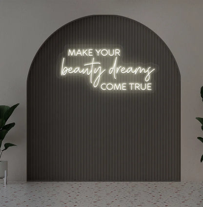 Warm white "make your beauty dreams come true" LED neon sign for beauty studio setup.