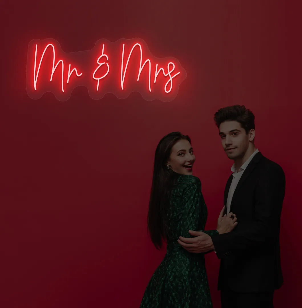 Image of a stylish Mr and Mrs wedding neon sign mounted on aesthetic wall in red color.
