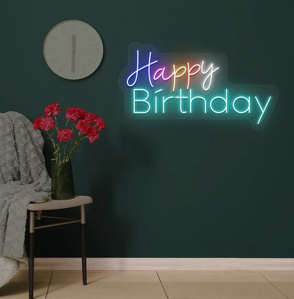 Image of a stylish multicolor Happy Birthday neon sign mounted on modern wall in ice blue color.