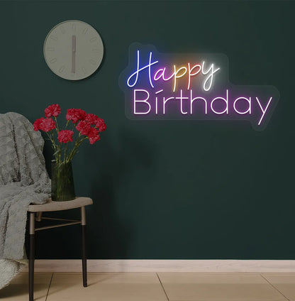Trendy multicolor Happy Birthday neon sign mounted on party backdrop wall in purple color.