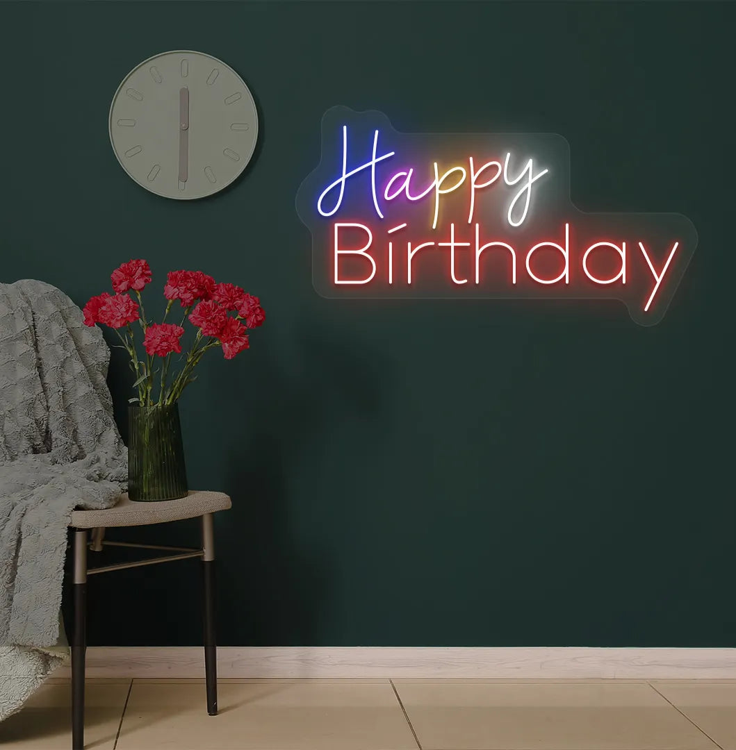 Image of a stylish multicolor Happy Birthday neon sign mounted on modern wall in red color.