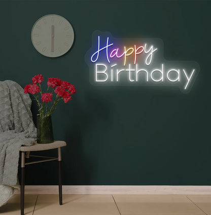 Image of a stylish multicolor Happy Birthday neon sign mounted on modern wall in white color.