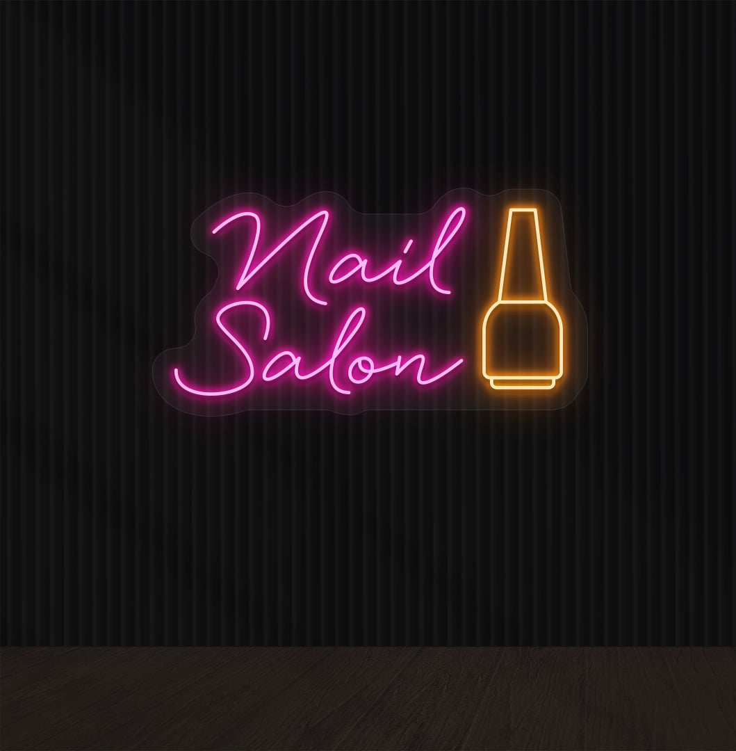 Image of a Nail Salon LED neon sign hanging on wall with a nail polish bottle sign in pink color.