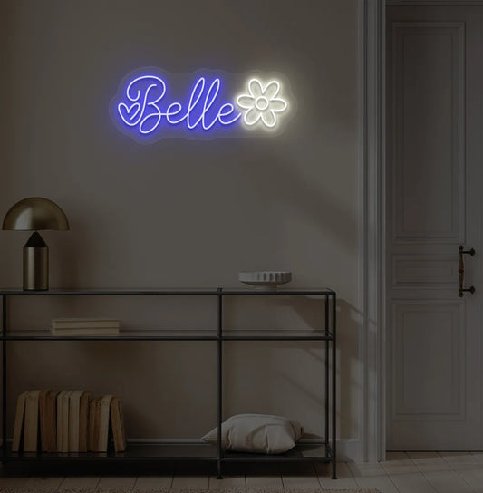 Personalized Name with Flower neon sign in blue color mounted on modern wall.