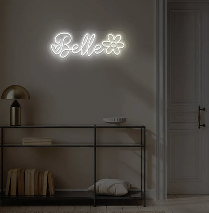 Personalized Name with Flower neon sign in white color mounted on modern wall.