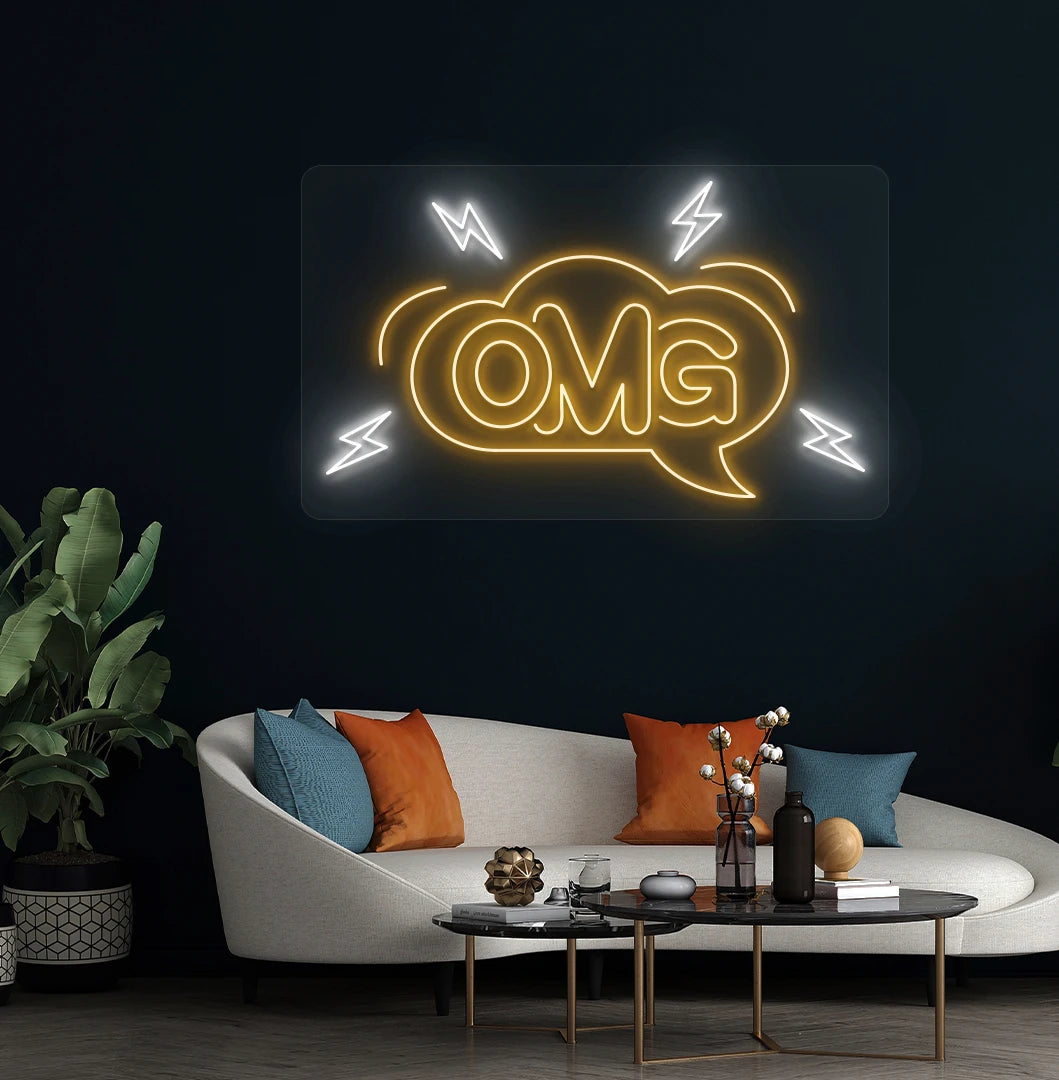 Trendy OMG neon sign in orange mounted on living room wall.