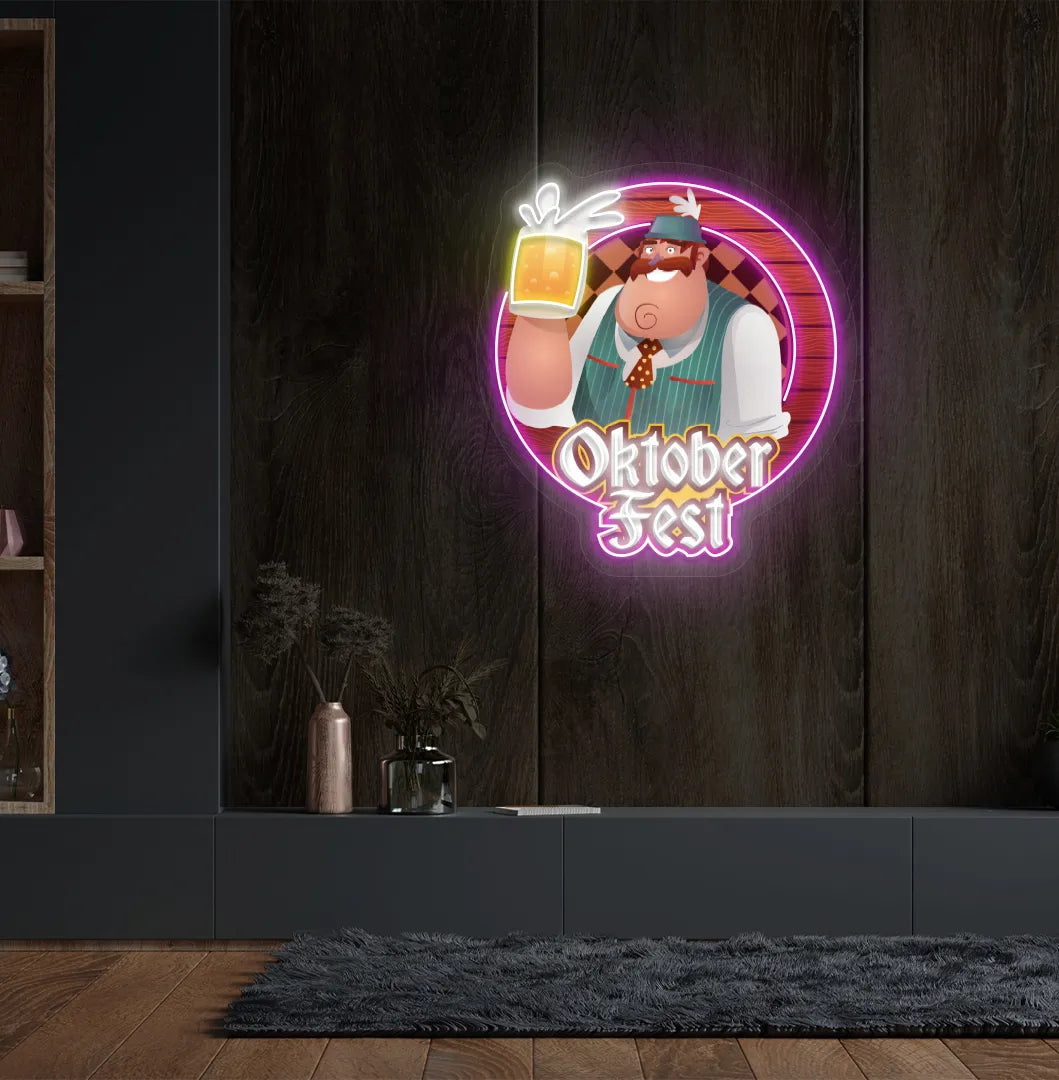 Oktoberfest Beer Guy LED neon sign with pink glow mounted on wall.