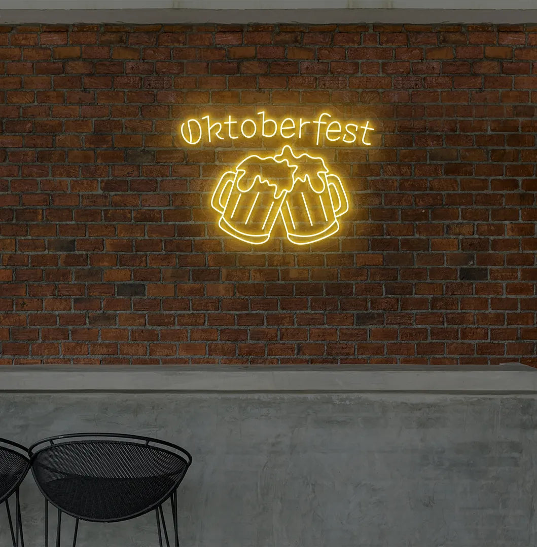 Oktoberfest with Beer Cup Neon Sign illuminated in orange and mounted on a wall