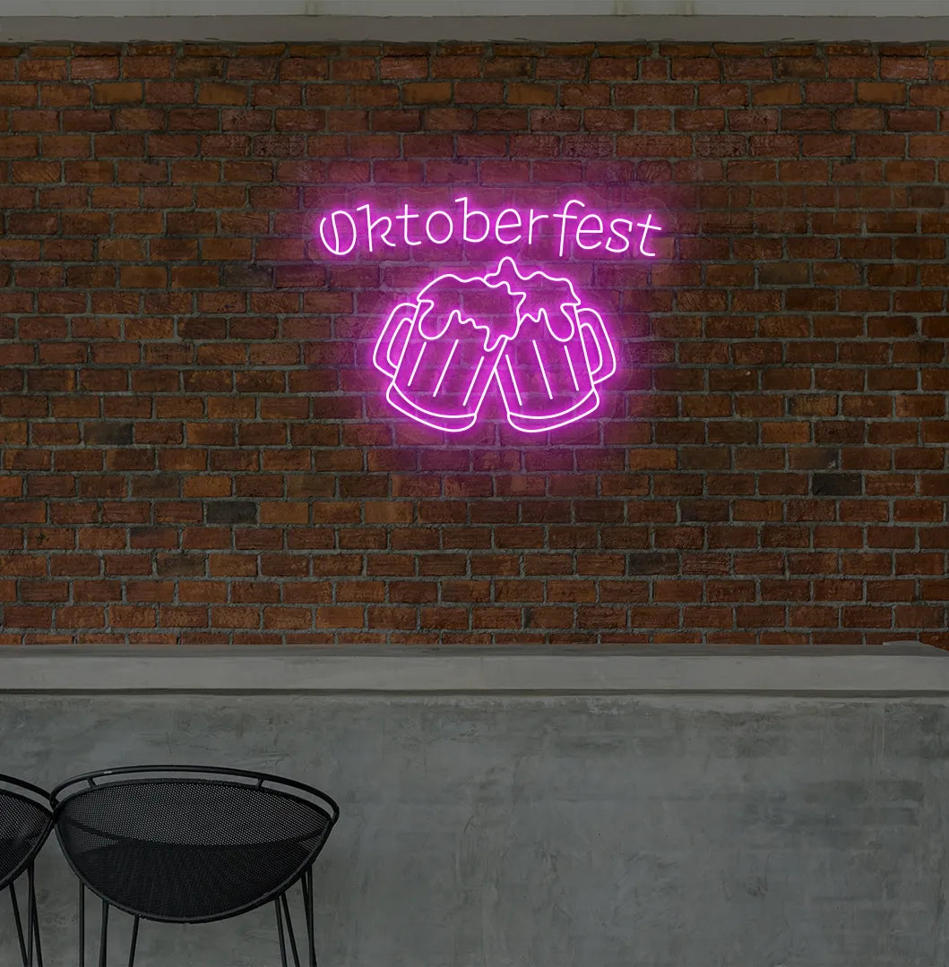Oktoberfest with Beer Cup pink Neon Sign creating a festive glow on a wall.