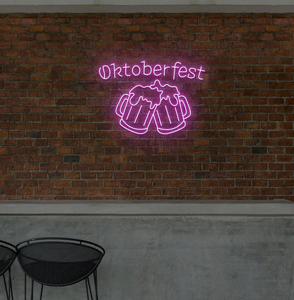 Oktoberfest with Beer Cup Neon Sign illuminated in purple and mounted on a wall