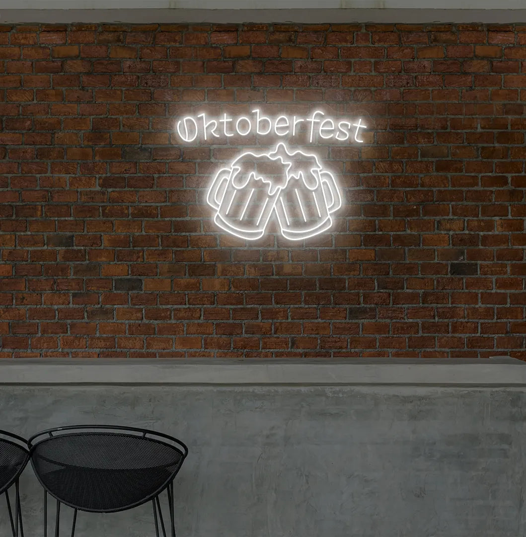 Oktoberfest with Beer Cup White Neon Sign creating a festive glow on a wall.