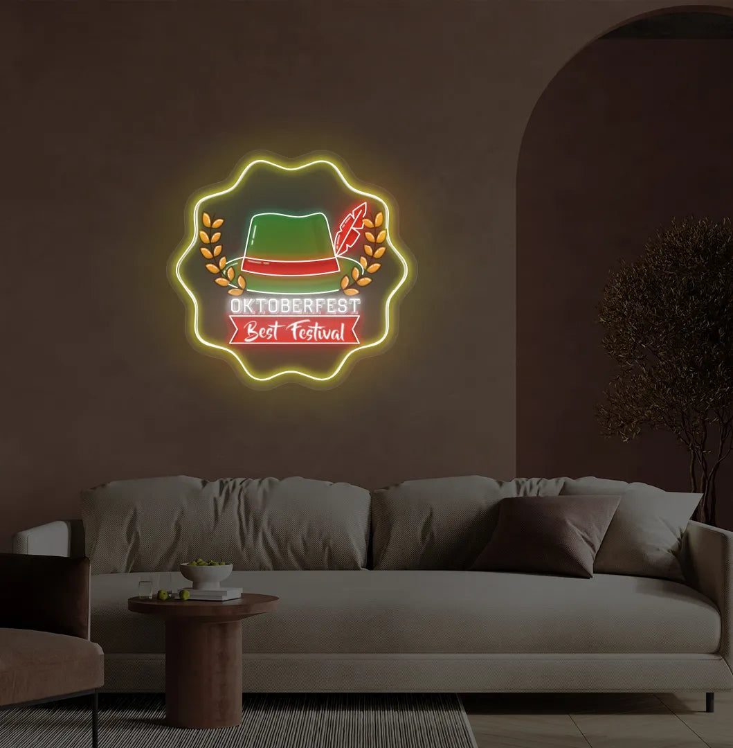 Oktoberfest with Hat Neon Sign illuminated in yellow and mounted on a wall.