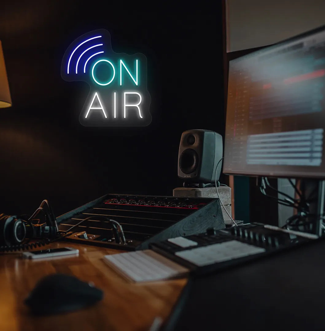 Image of an aesthetic studio room wall with "on air network" neon sign glowing ice blue.