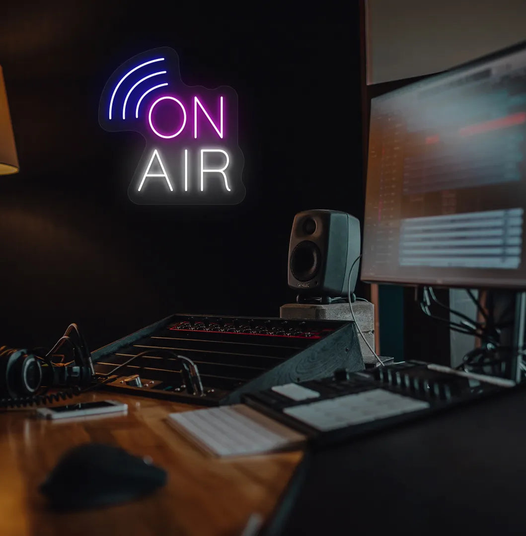 Image of an aesthetic studio room wall with "on air network" neon sign glowing pink.