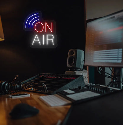 Image of an aesthetic studio room wall with "on air network" neon sign glowing red.