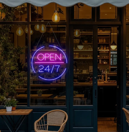 Image of a stylish Open 24/7 neon sign mounted on coffee shop glass door in blue color.
