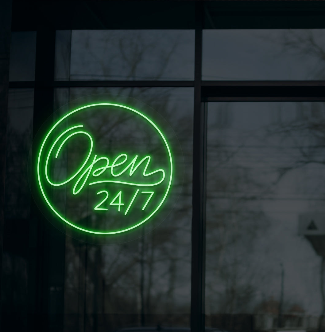 Business storefront with "open 24/7" LED neon sign glowing green.