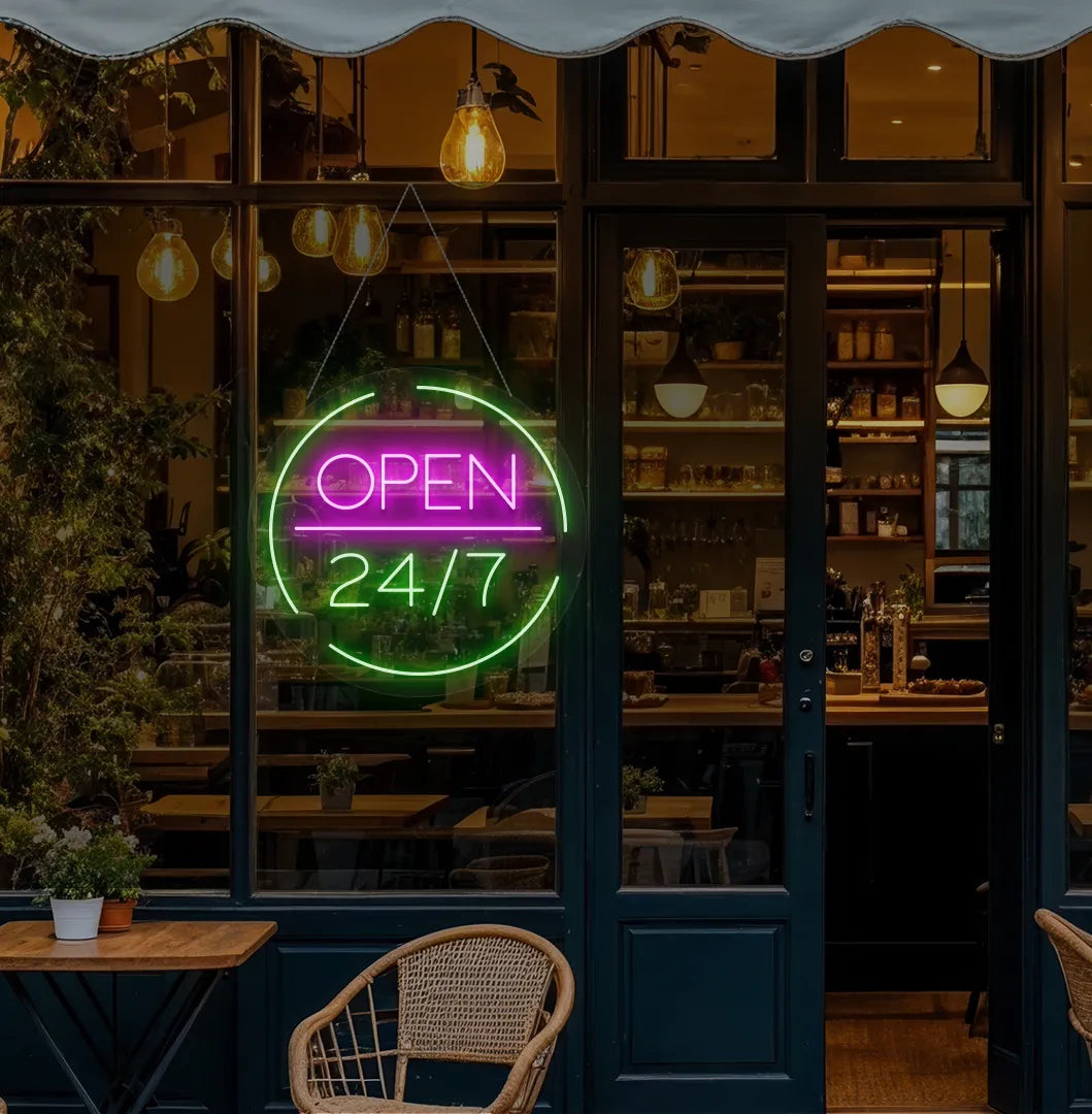 Modern cafe entrance with Open 24/7 neon sign glowing green.
