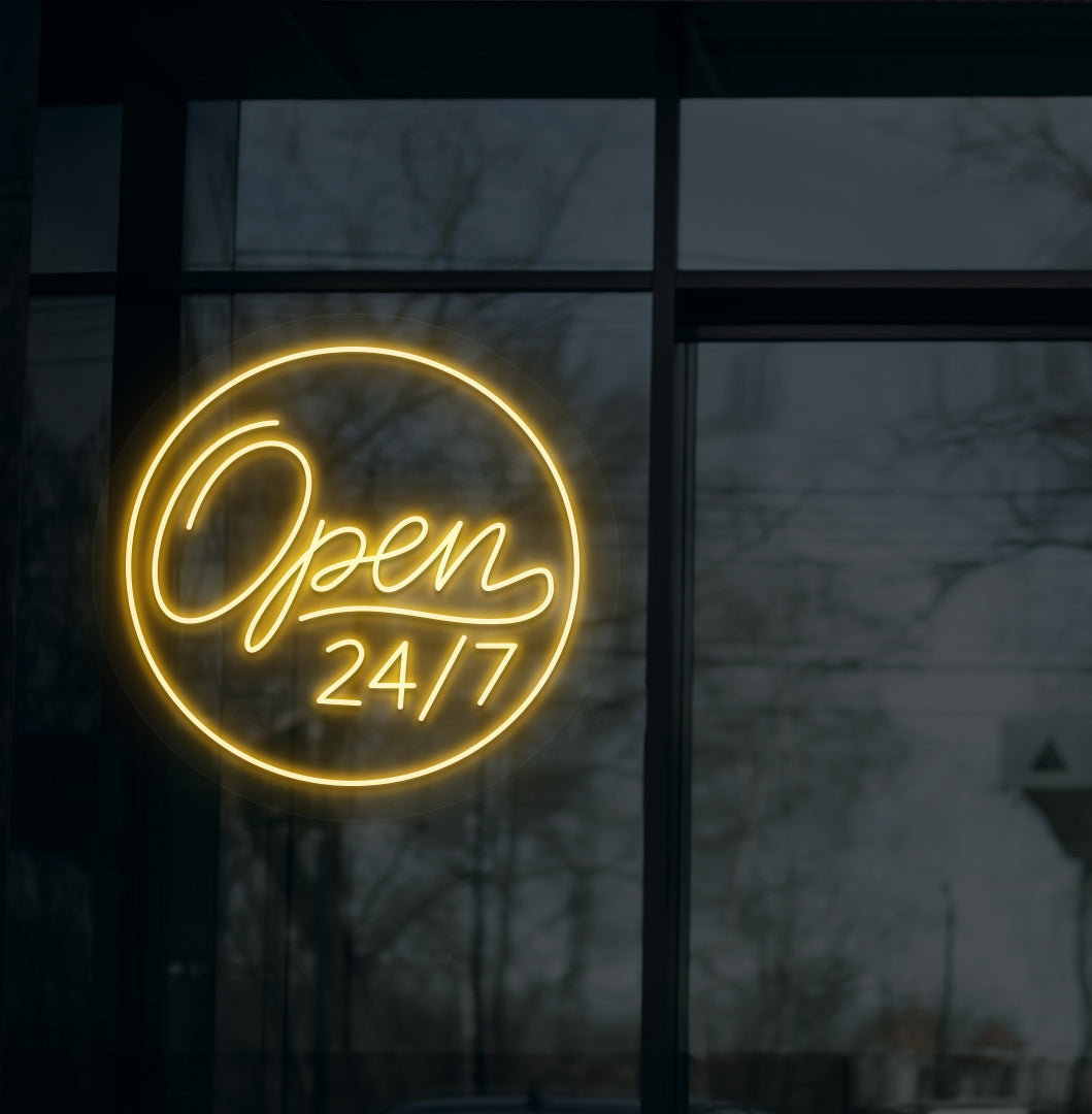 Business storefront with "open 24/7" LED neon sign glowing orange.