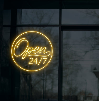 Business storefront with "open 24/7" LED neon sign glowing orange.