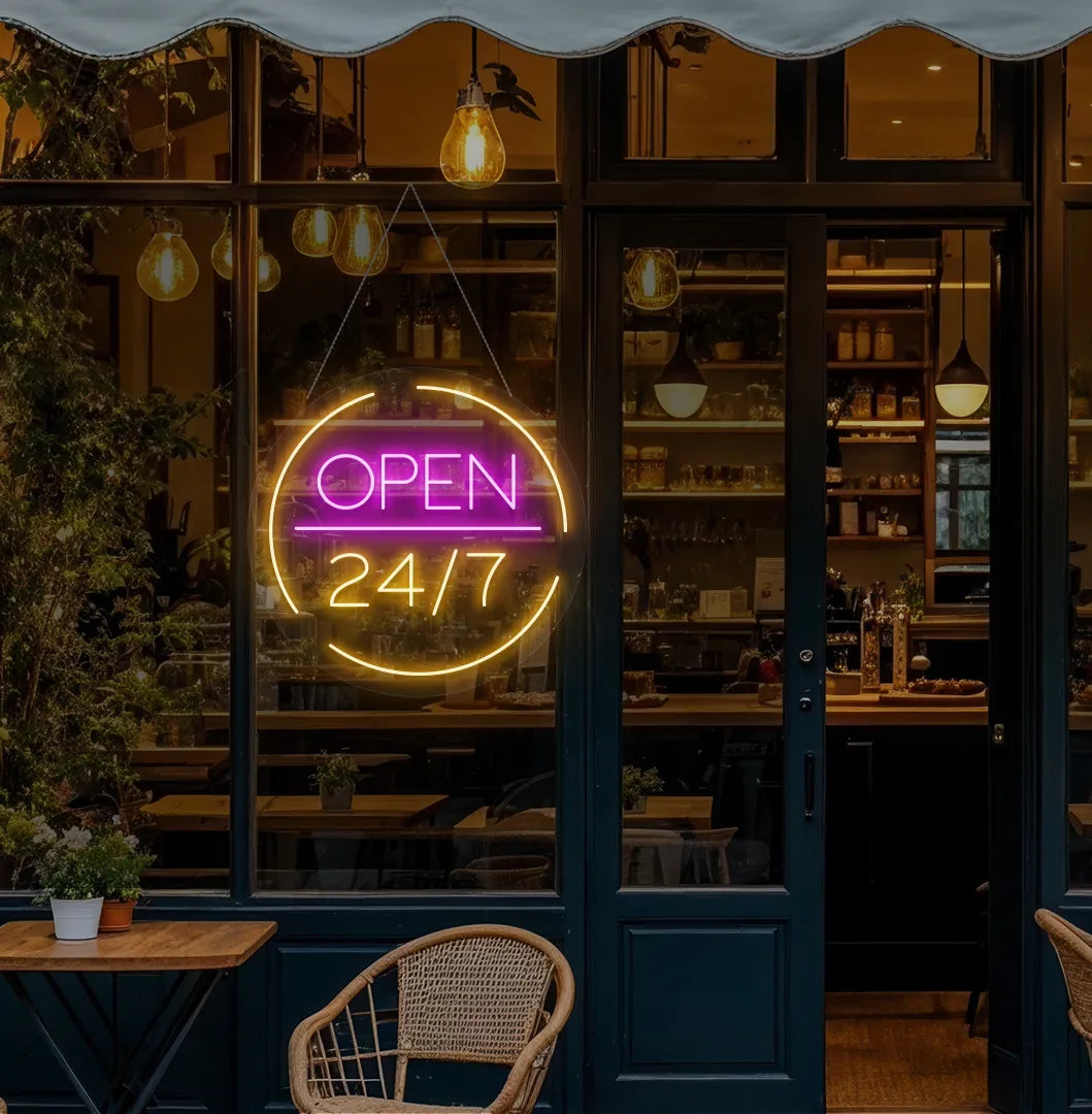 Modern cafe entrance with Open 24/7 neon sign glowing orange.