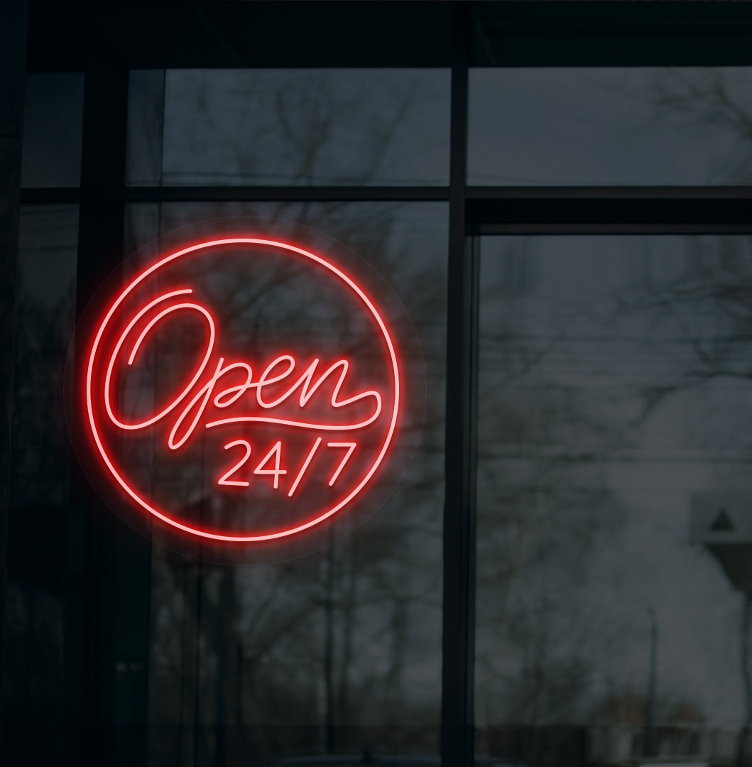 Image of a modern "open 24/7" LED neon sign glowing on wall in red color.