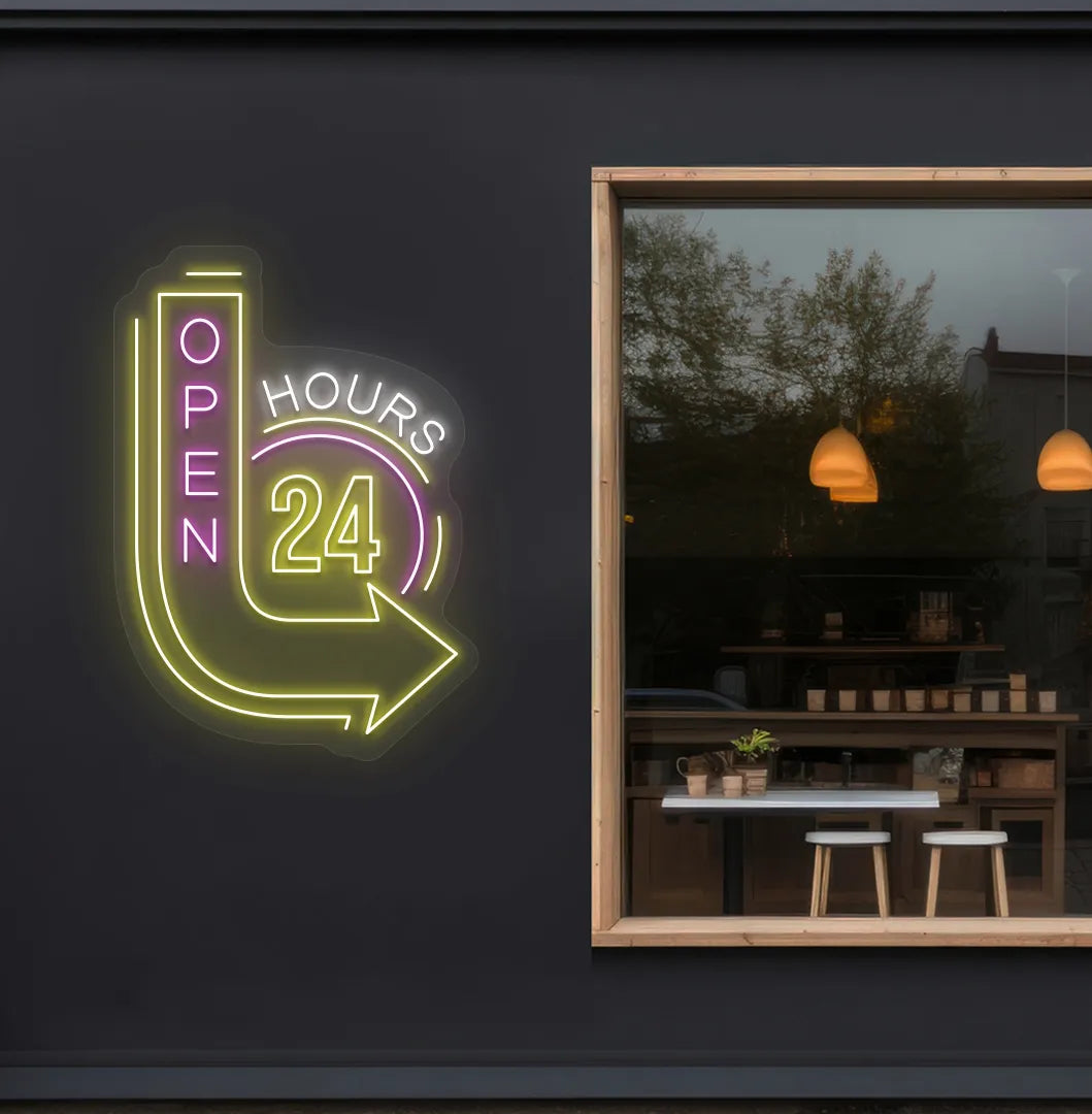 Trendy open 24 hours with arrow neon sign in yellow mounted on storefront.