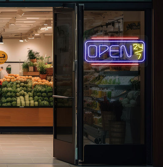 Image of an open 24/7 LED neon sign glowing on a store glass door in blue color.
