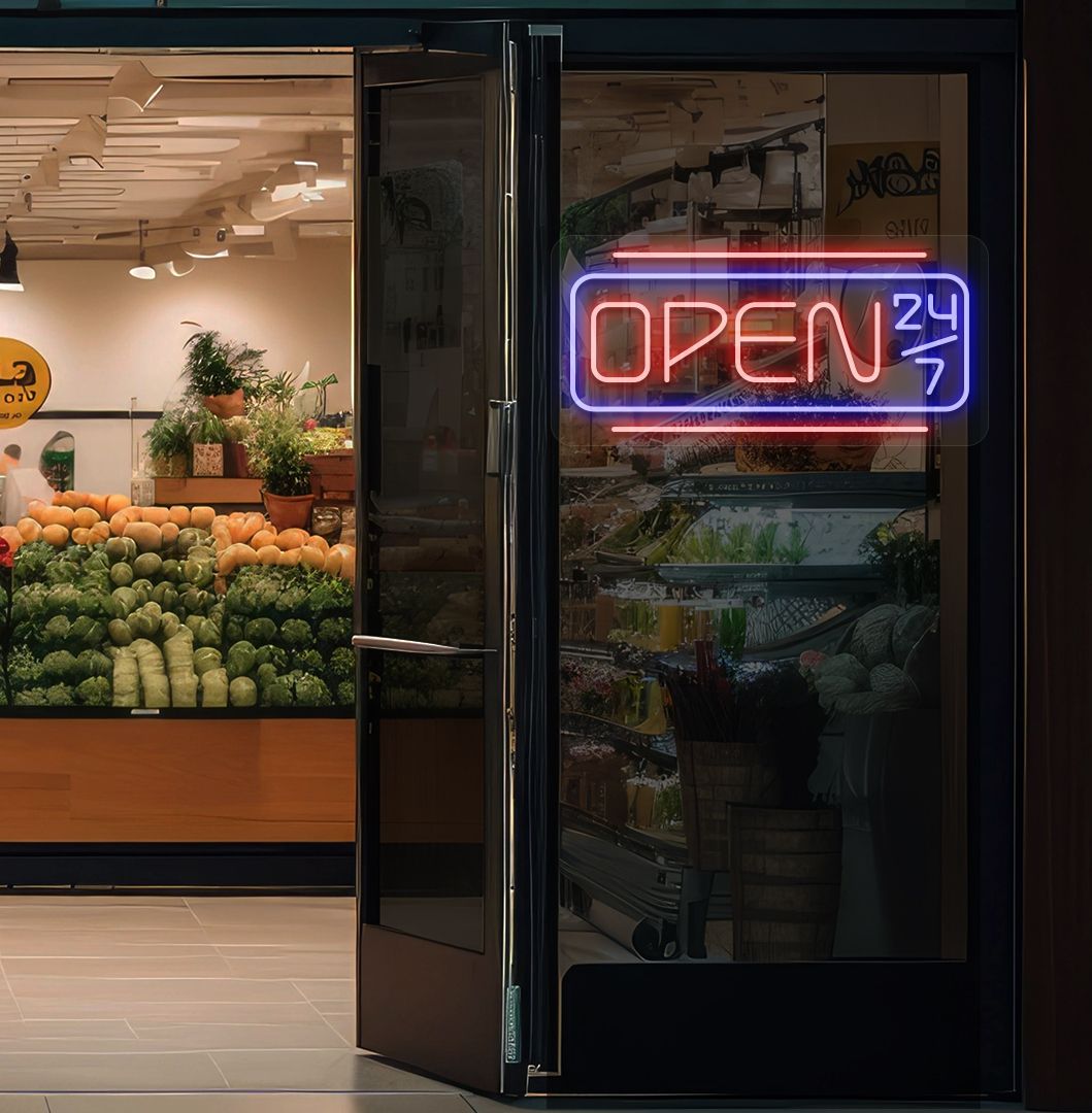 Image of an open 24/7 LED neon sign glowing on a store glass door in red color.