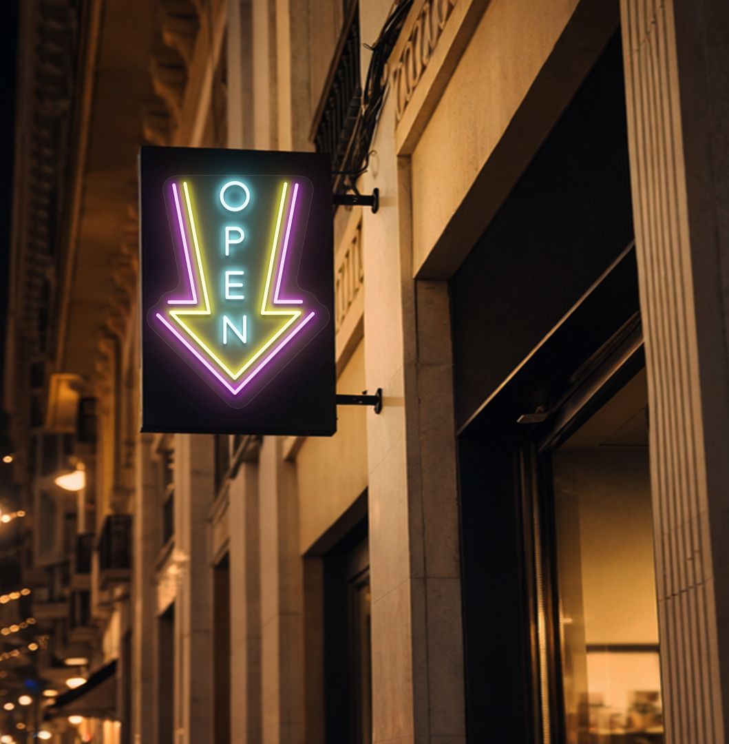Image of an open arrow neon sign glowing on outdoor shop stand in ice blue color.