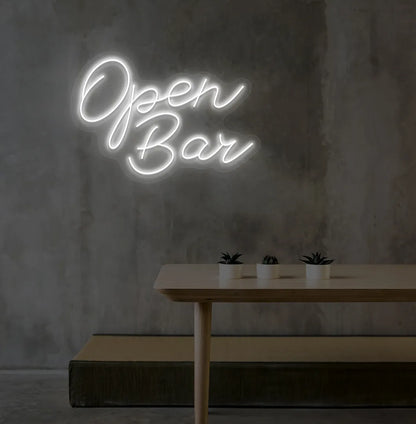 Image of an Open Bar neon sign mounted on an aesthetic wall in white color.