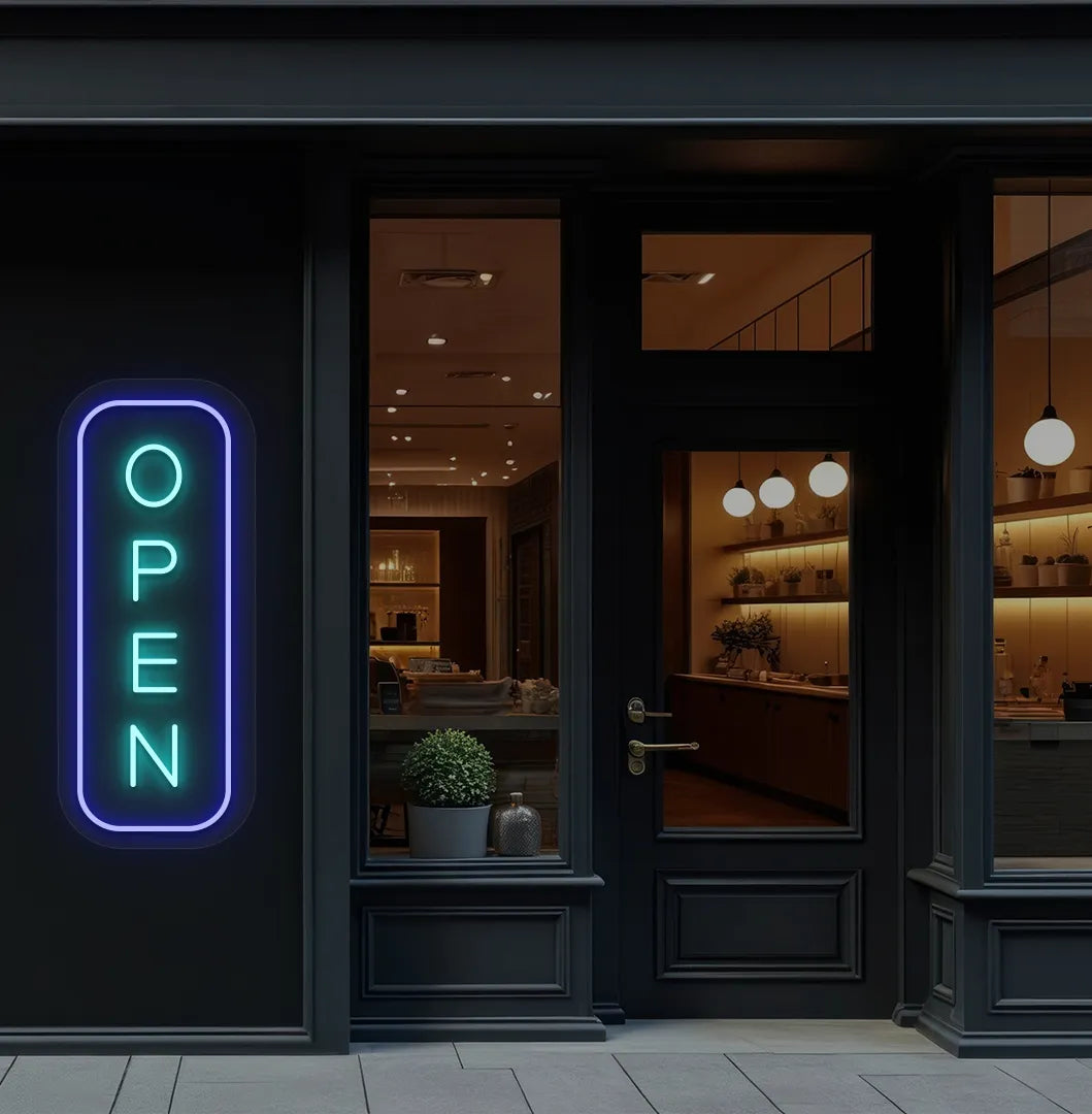 Image of an open LED neon sign glowing on a shop exterior wall in ice blue color.
