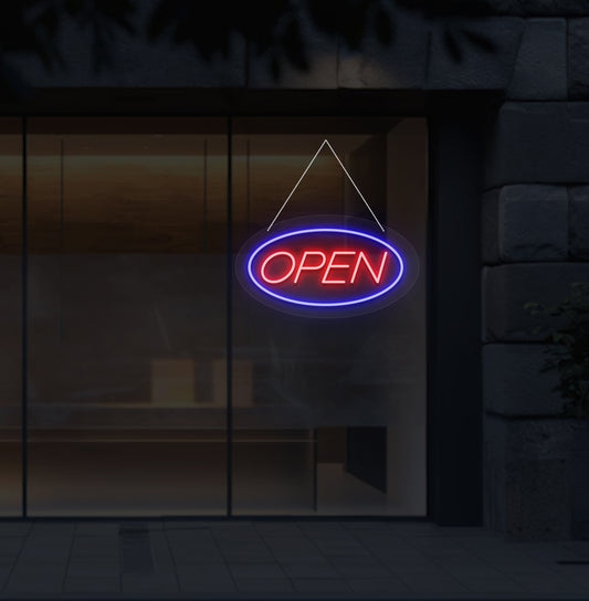 Image of a stylish open LED neon sign glowing blue and red on storefront wall.