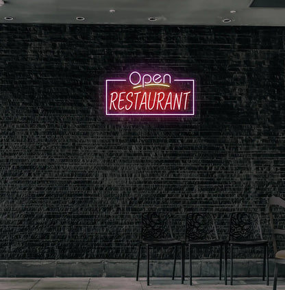 Stylish open restaurant neon sign in purple mounted on restaurant wall.