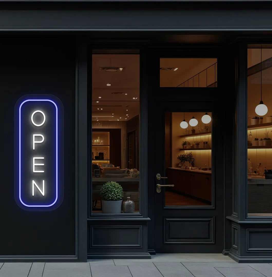 Image of an open LED neon sign glowing on a shop exterior wall in white color.