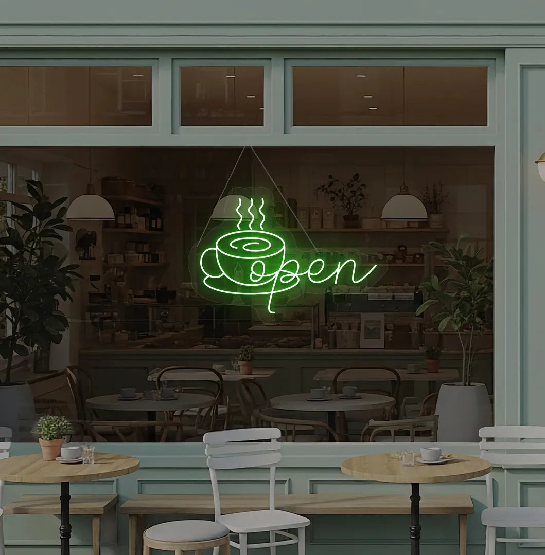 Modern cafe wall with open with coffee cup neon sign glowing green.