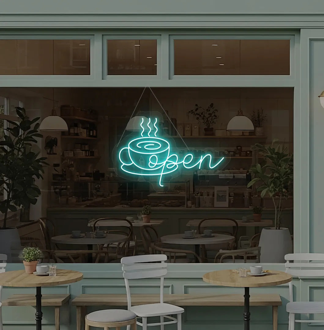 Image of an open with coffee cup neon sign hanging on cafe glass door in ice blue color.