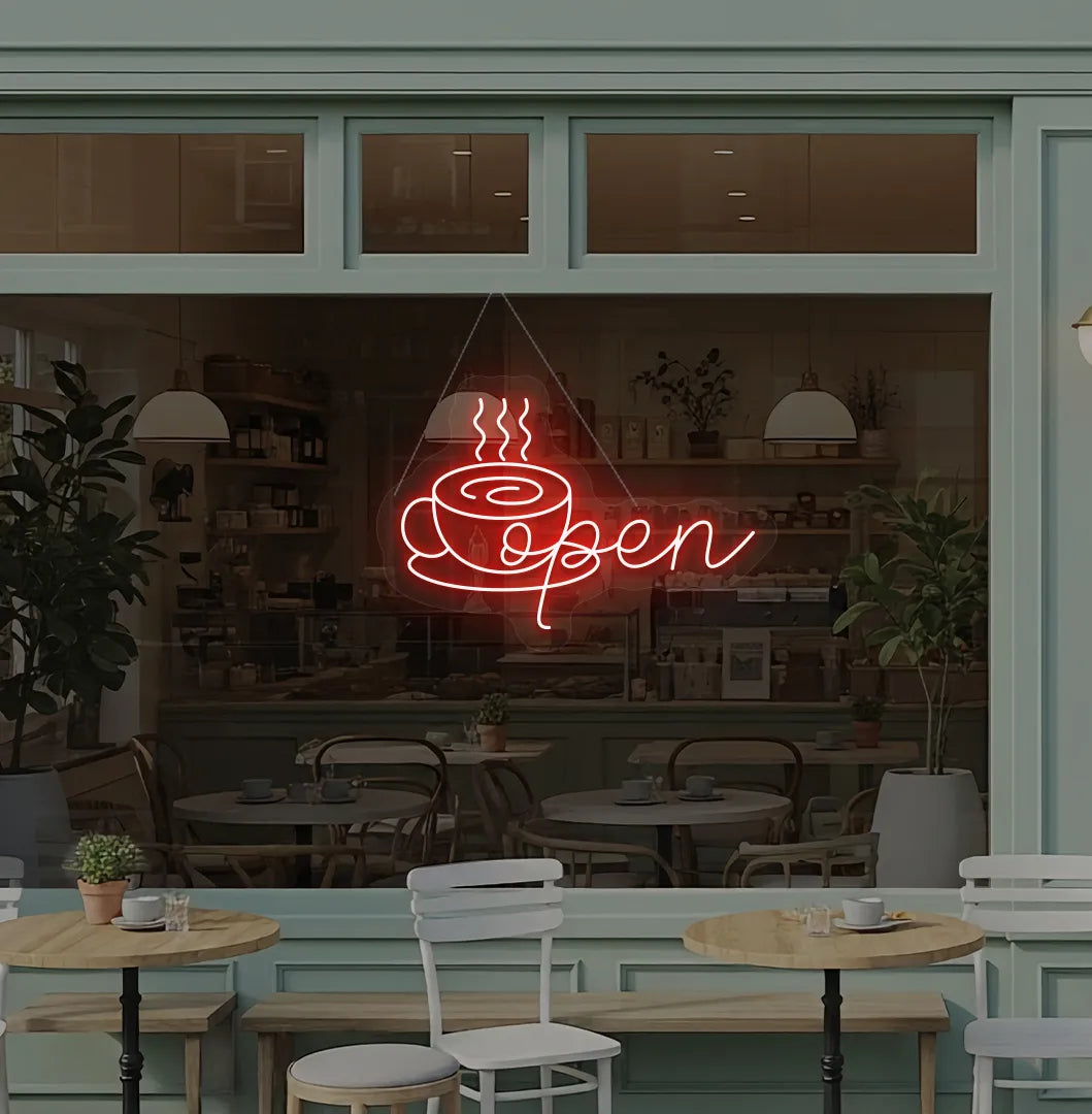Image of an open with coffee cup neon sign hanging on cafe glass door in red color.