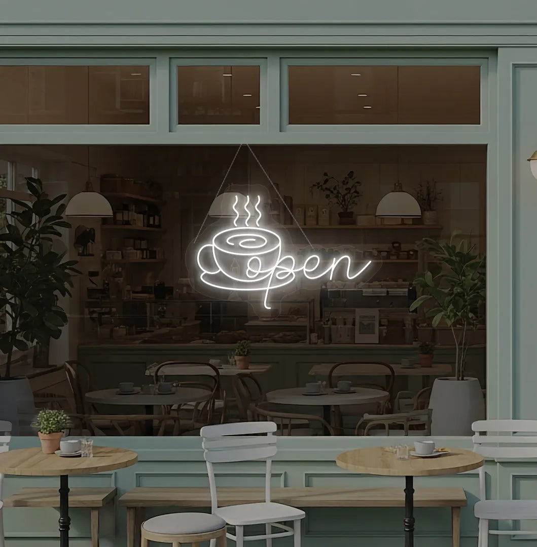 Image of an open with coffee cup neon sign hanging on cafe glass door in white color.