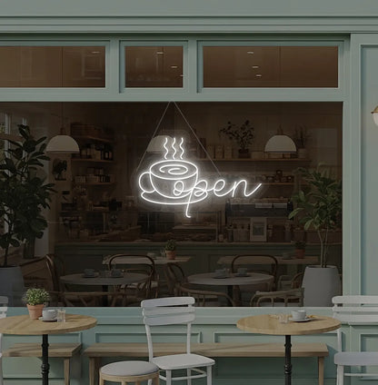 Image of an open with coffee cup neon sign hanging on cafe glass door in white color.