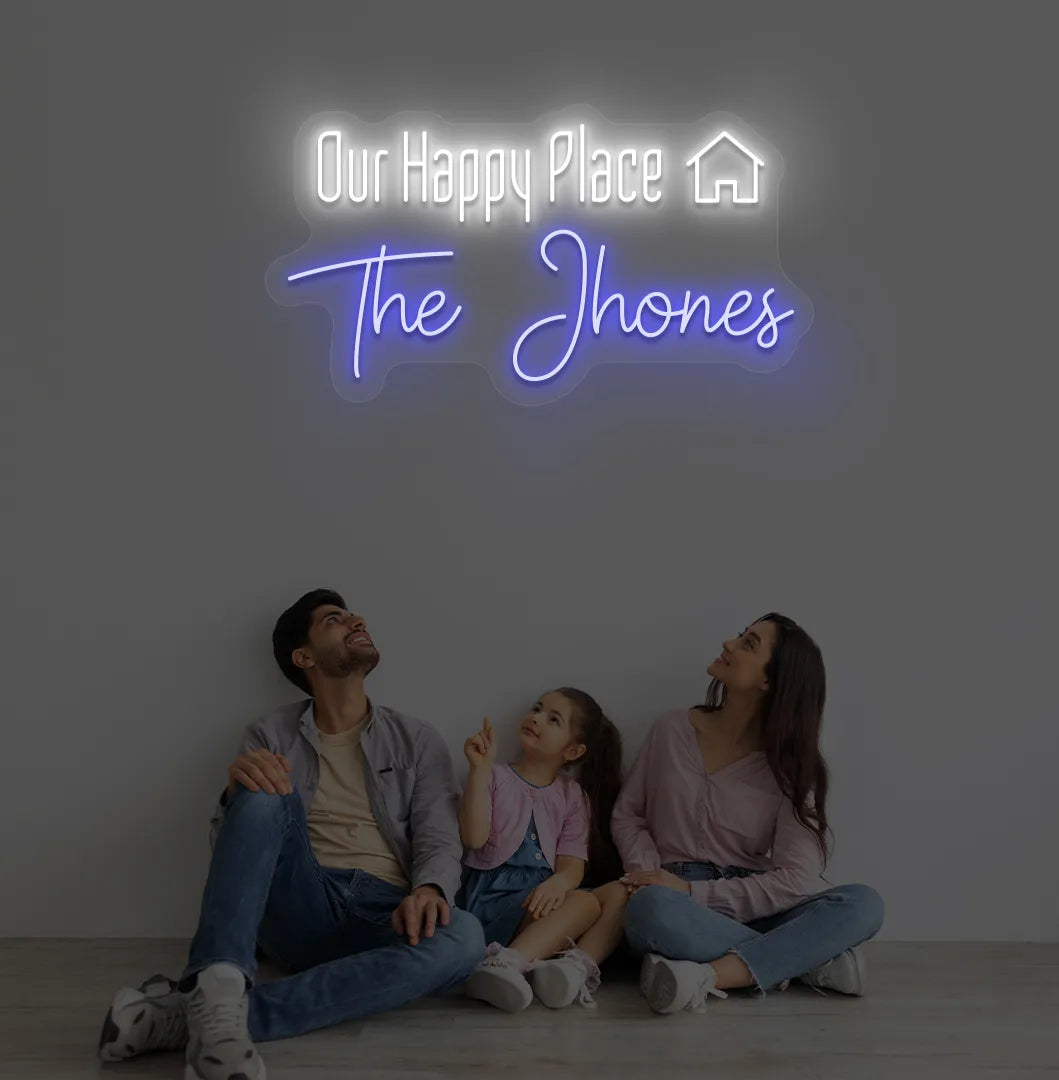 Personalized Our Happy Place custom name neon sign in blue color mounted on modern wall.