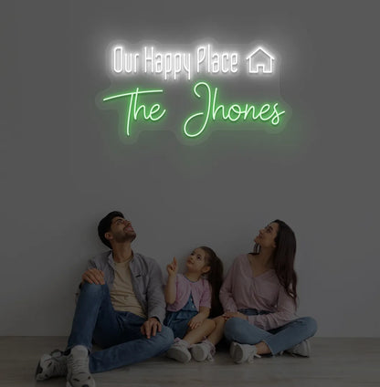 Bright green Our Happy Place personalized name neon sign for home decoration.