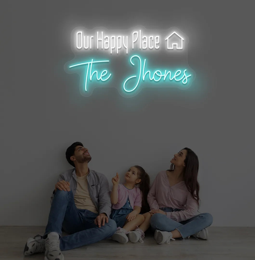 Personalized Our Happy Place custom name neon sign in ice blue color mounted on modern wall.