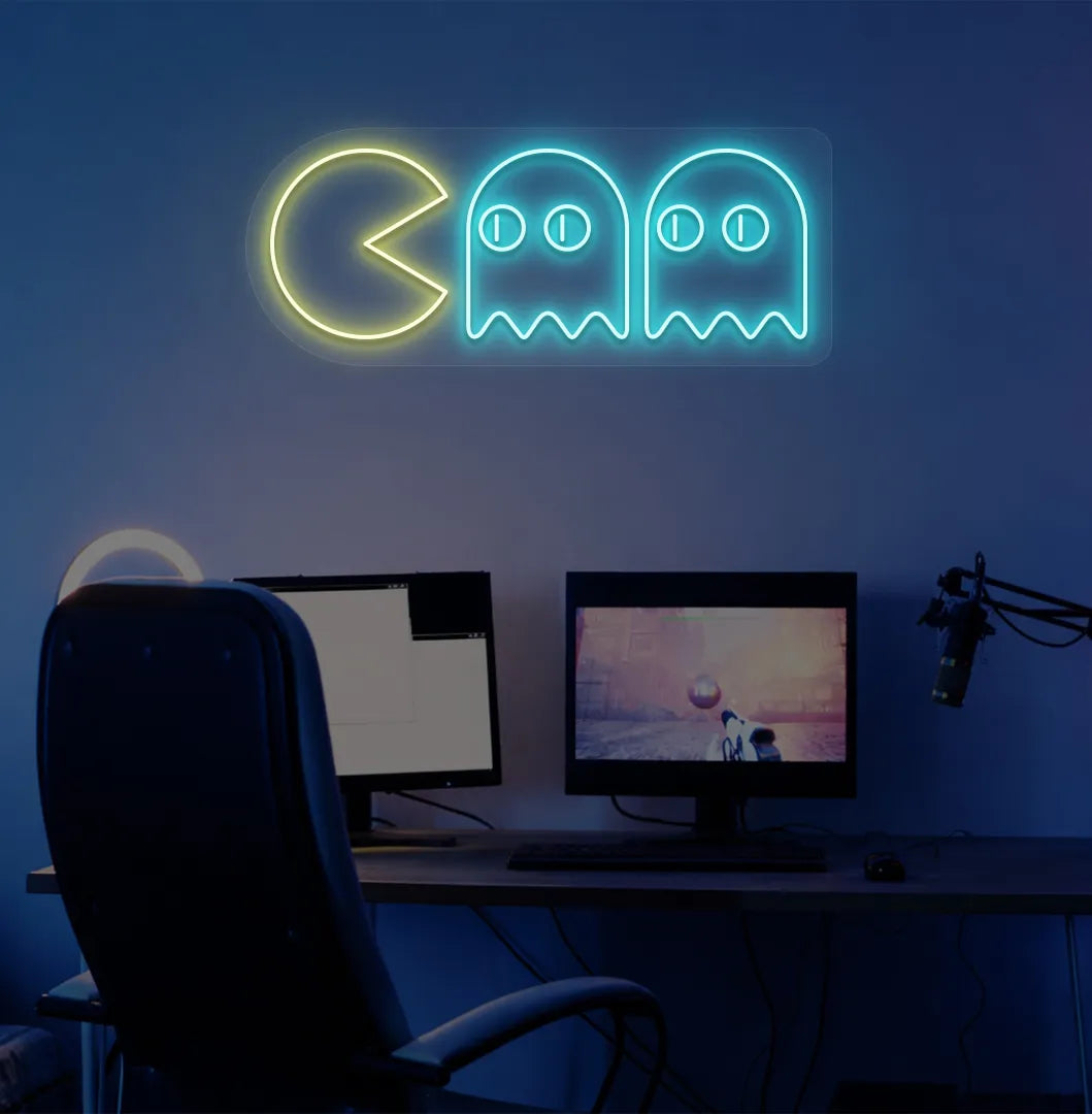 Image of a retro arcade Pacman neon sign mounted on gamer room wall in ice blue color.