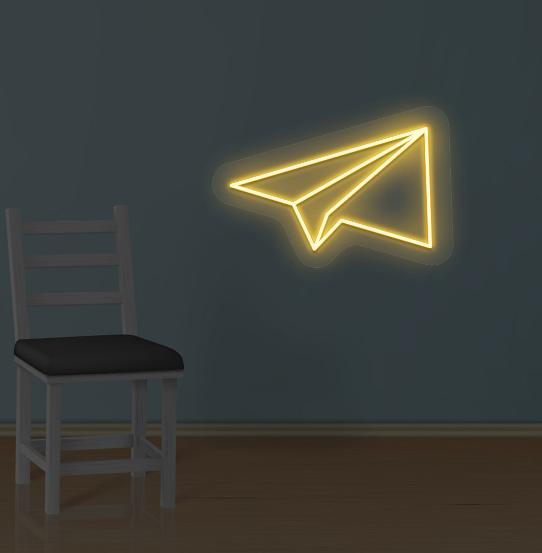 Modern wall with paper plane LED neon sign glowing orange.